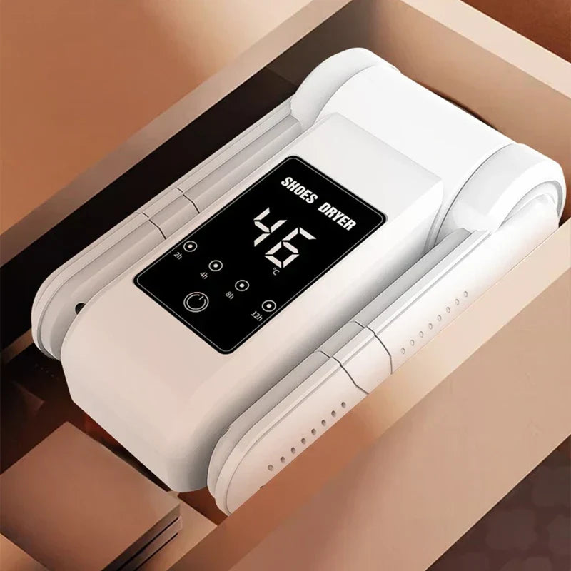Top-down view of a folded white electric shoe dryer with a digital control panel showing 46°C and timer settings