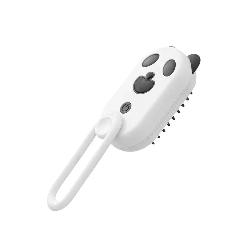 A white panda-style electric spray handle massage brush with a hanging loop and soft bristle side on a white background.
