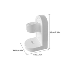 Soporte para cepillo de dientes eléctrico - Soporte de clip blanco montado en pared con etiquetas de dimensiones sobre un fondo liso
