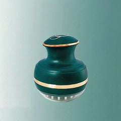 Energy Pen - Green electric scalp massager with gold trim and soft silicone bristles on a teal background