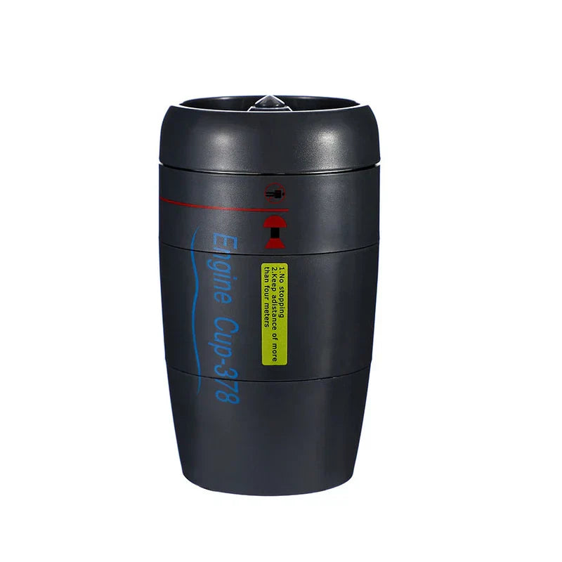 Suction Tumbler Mug - Matte black engine-styled tumbler with printed text and warning labels against a white background