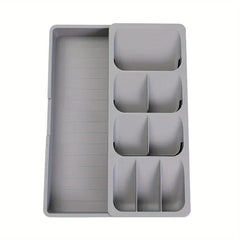Cutlery Drawer Organizer - Light gray expandable storage tray with divided compartments and extended long storage section, shown against a plain white background