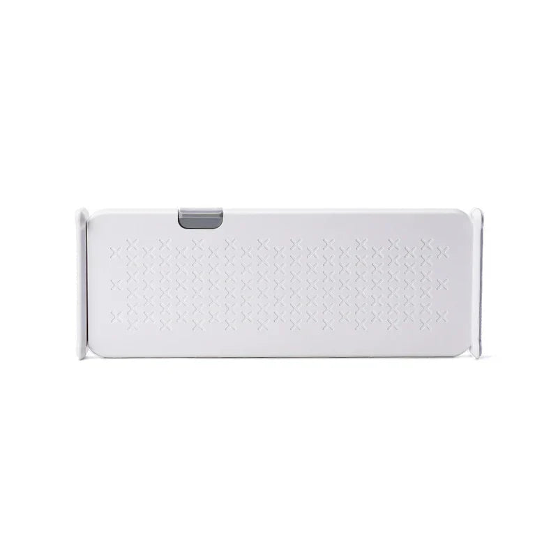 White expandable closet drawer organizer with textured X pattern shown on plain white background