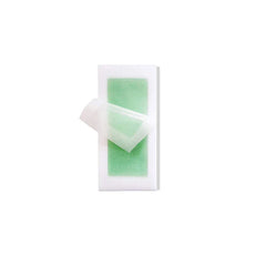 Wax Strips Paper - Stack of pre-waxed facial wax strips with protective film partially peeled back
