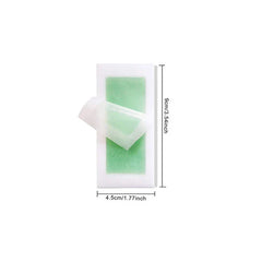 Wax Strips Paper - Small rectangular wax strip with one protective liner partially peeled back, showing width and length measurements