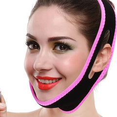 Massager Device - Black and pink facial lifting strap worn on a person's lower face and jaw, demonstrating fit around the ear