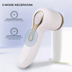 Callus Remover - A white handheld device with a rose gold switch panel, showing two speed mode indicators in Indonesian on a light blue background.
