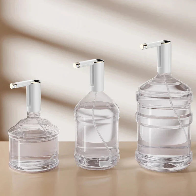 Gallon Jug - Three identical water pumps fitted onto clear water bottles of increasing small, medium, large sizes