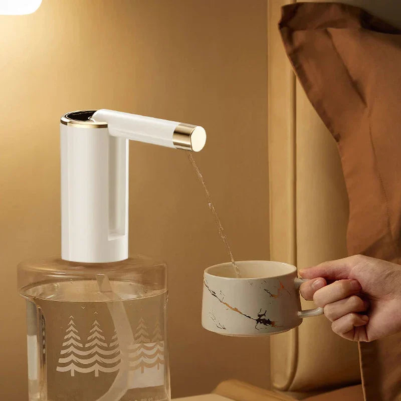 Gallon Jug - White electric water dispenser on a clear bottle dispensing water into a held marble-patterned cup