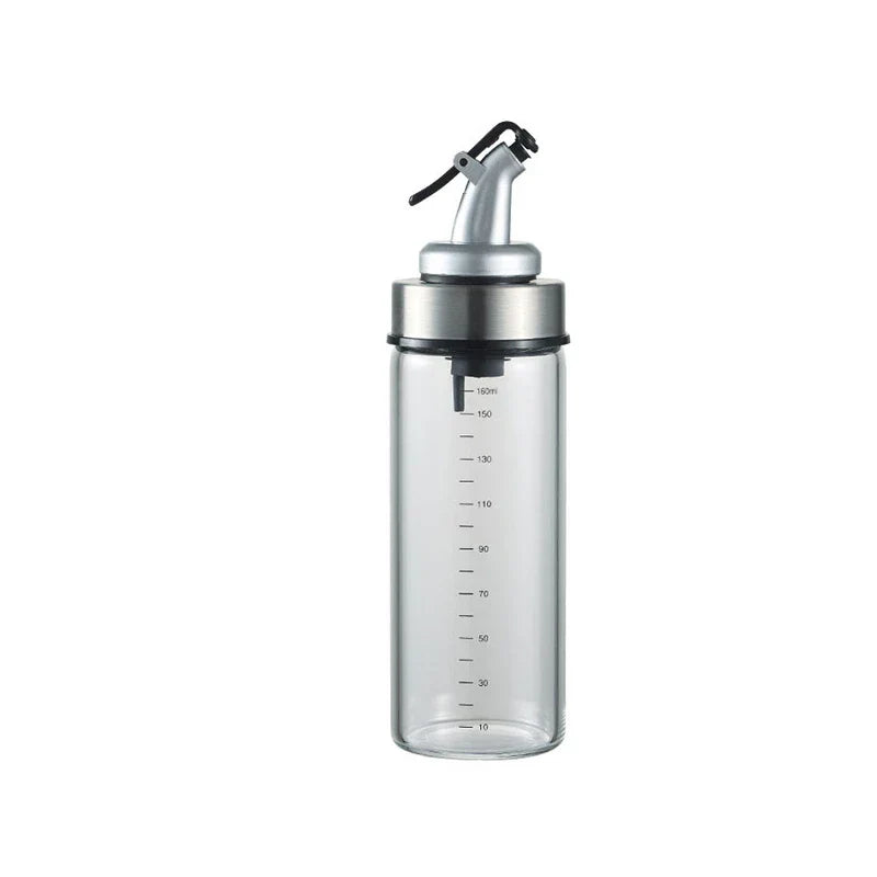 Glass Cruet - Clear cylindrical dispenser with stainless steel collar, lever pour spout, and printed volume measurement markings