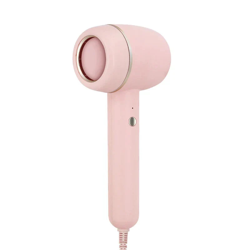 Ionic Hair Dryer - Light pink compact handheld hair dryer front view with single control button