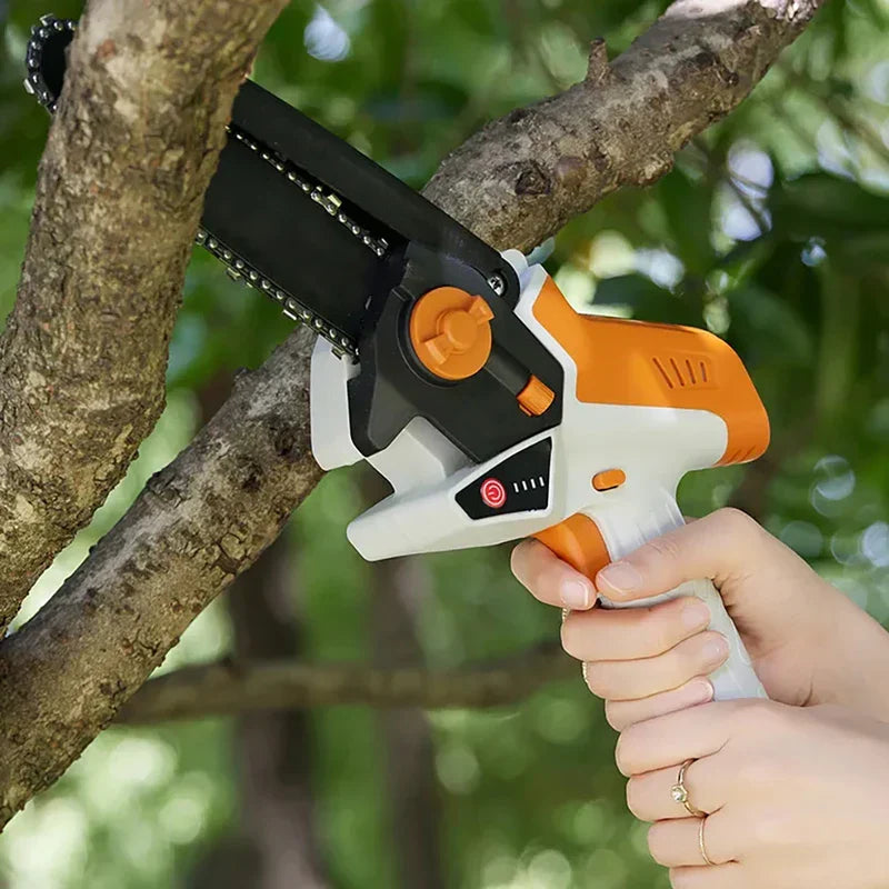 Close-up of the mini chainsaw blade and handle