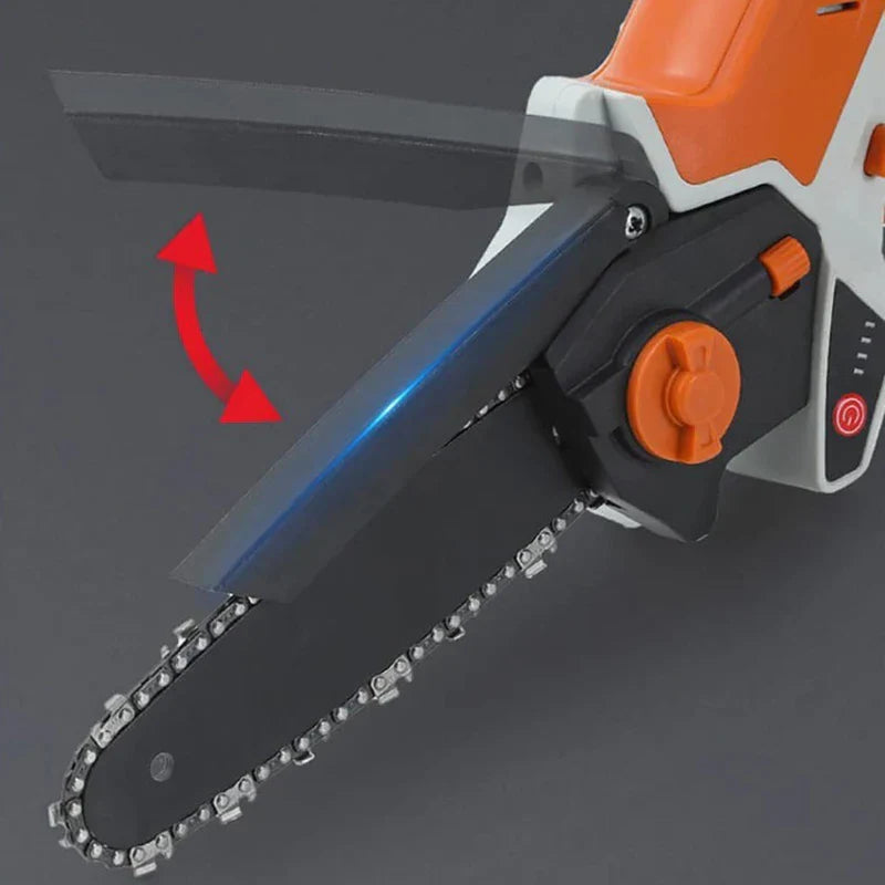 Mini chainsaw resting on a workbench with garden tools