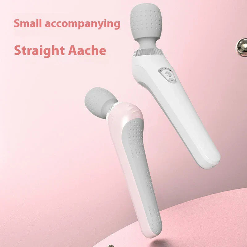 Handheld Body Massager - Two handheld wand massagers, one white and one light pink, against a pink background, with partial text visible.