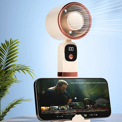 Portable handheld fan on a desk