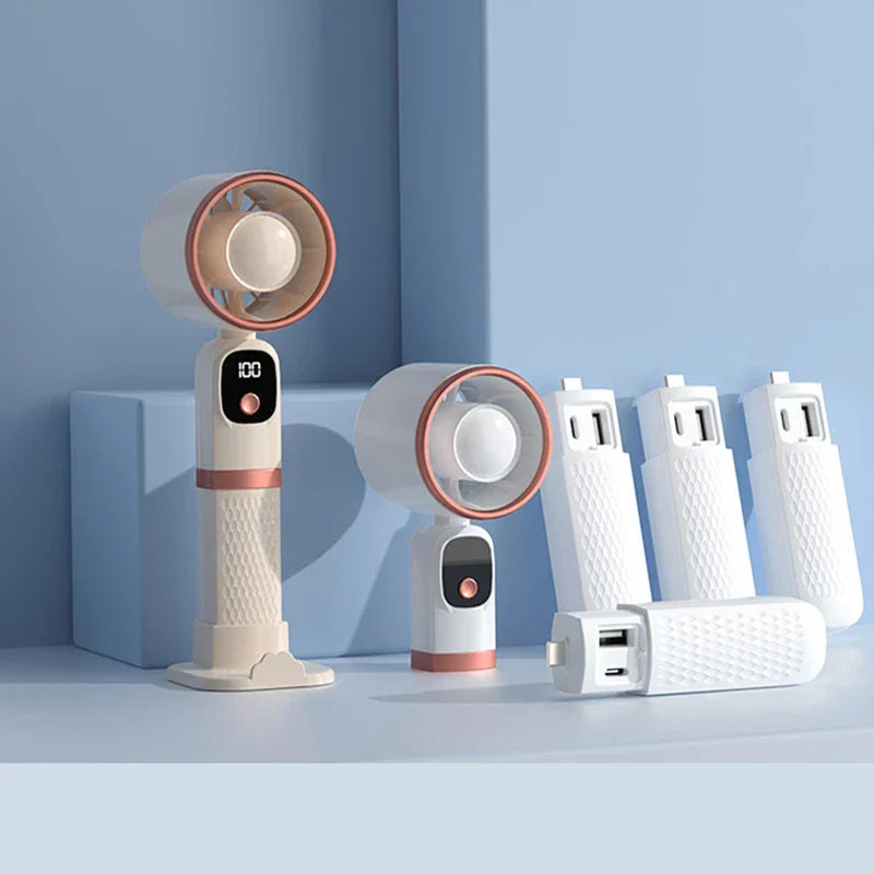 Handheld fan with power bank charging a phone