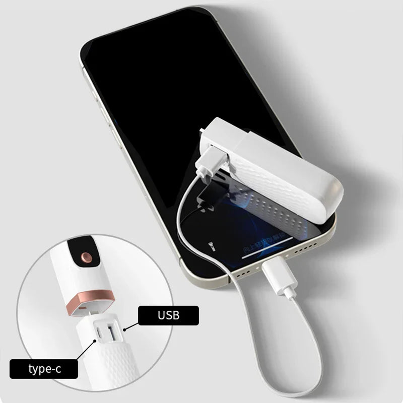 Handheld fan handle detached as a power bank charging a smartphone via cable, with USB and type-c port callouts