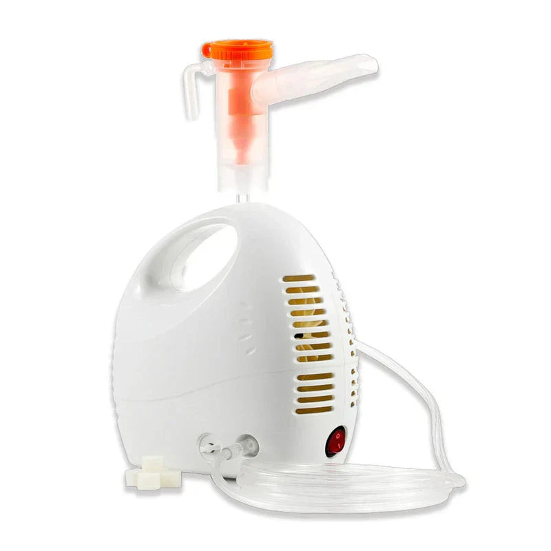 White handheld fine mist atomizer device with orange-capped nebulizer cup, coiled clear tube, and power switch on a white background.