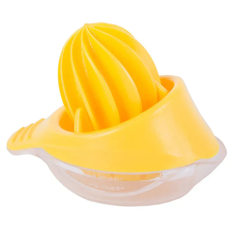 Handheld Citrus Juice Extractor - Yellow manual juicer with clear measuring base and pour spout
