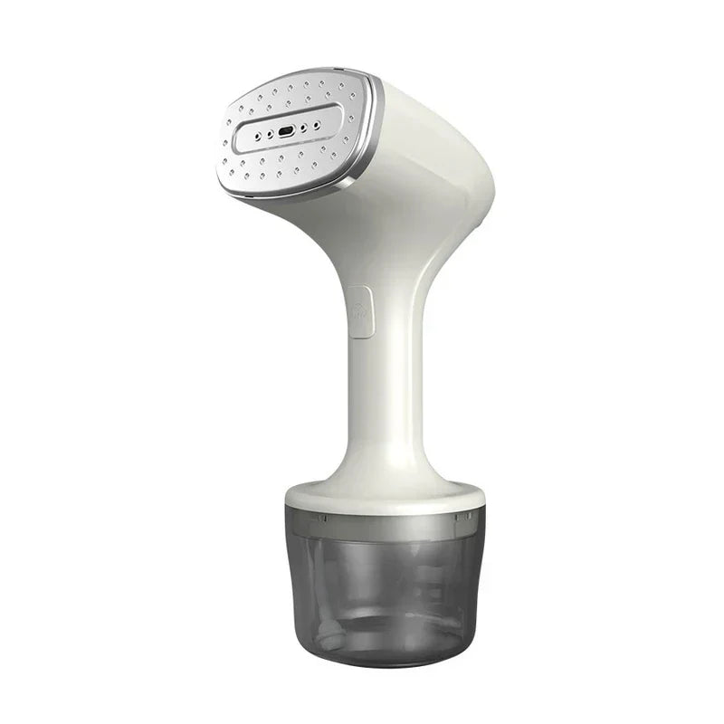 vaporizador de prendas - Vaporizador de prendas de mano sostenido cerca de una camisa para eliminar arrugas
