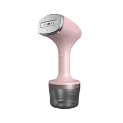 vaporizador de prendas - Vaporizador de prendas de mano rosa con depósito de agua gris transparente, visto sobre fondo blanco liso