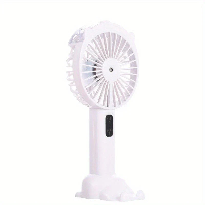 Handheld Misting Fan - White unit with cat ear design, standing on its integrated base