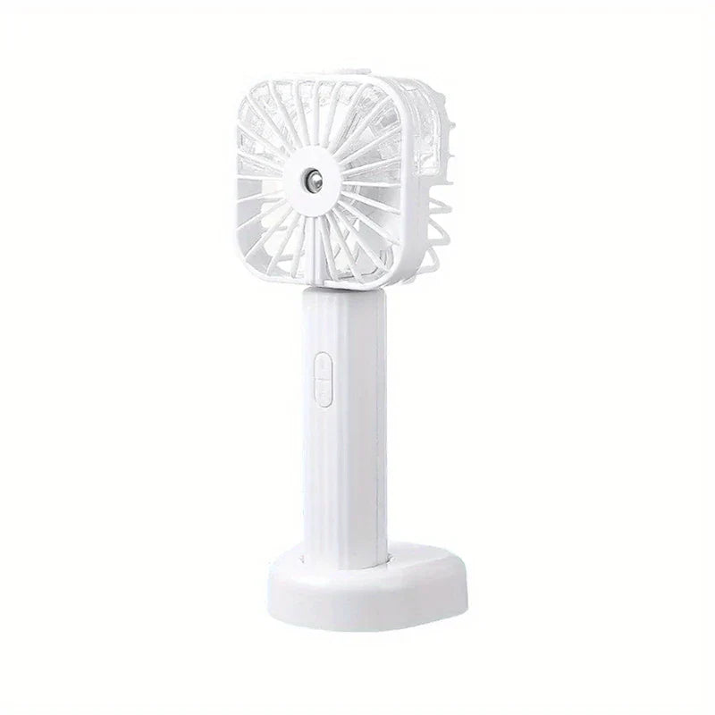 Mist Sprayer - White unit with integrated fan, spray nozzle, handle control button, and matching desktop base