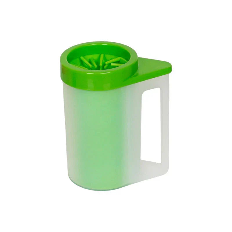 Portable pet paw cleaner with translucent light green body, bright green top with internal bristles, and integrated side handle.