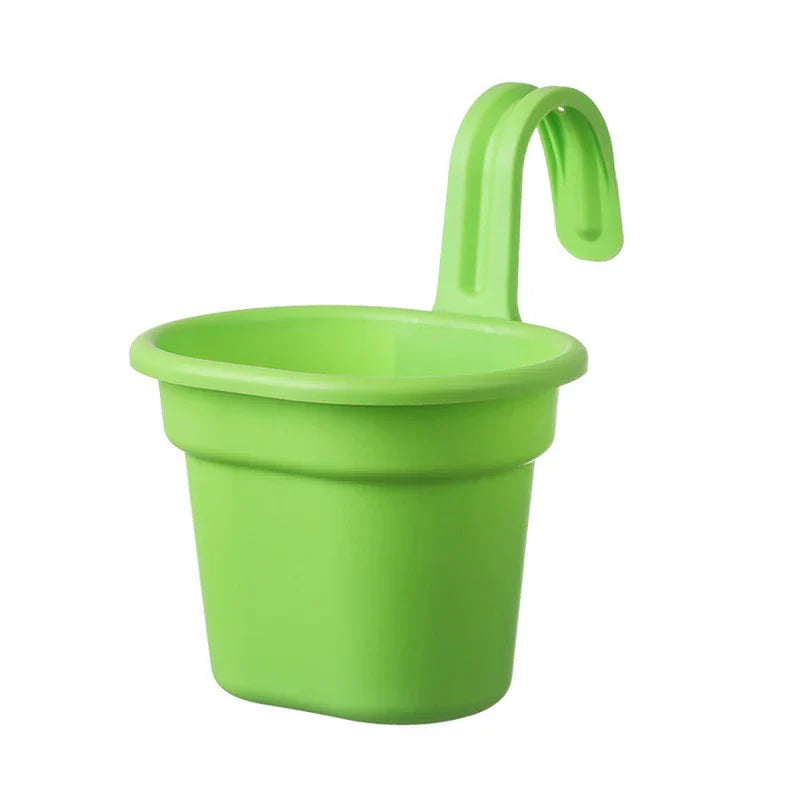 Basket Planter - Bright green plastic hanging planter with curved hook, shown on a plain white background