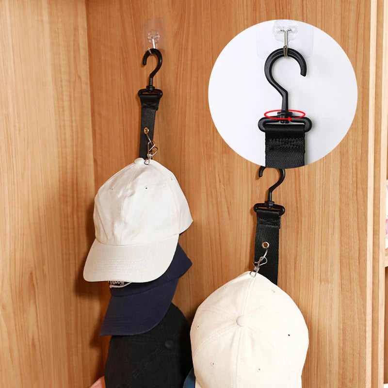 Hat Organizer - Strap mounted on an adhesive wall hook, with closeup of the 360-degree swivel hook joint