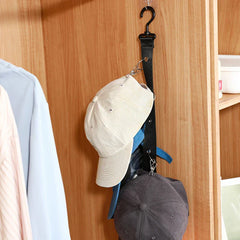 Hat Organizer - Hat hanger with clips holding baseball caps, hanging from a hook in a closet