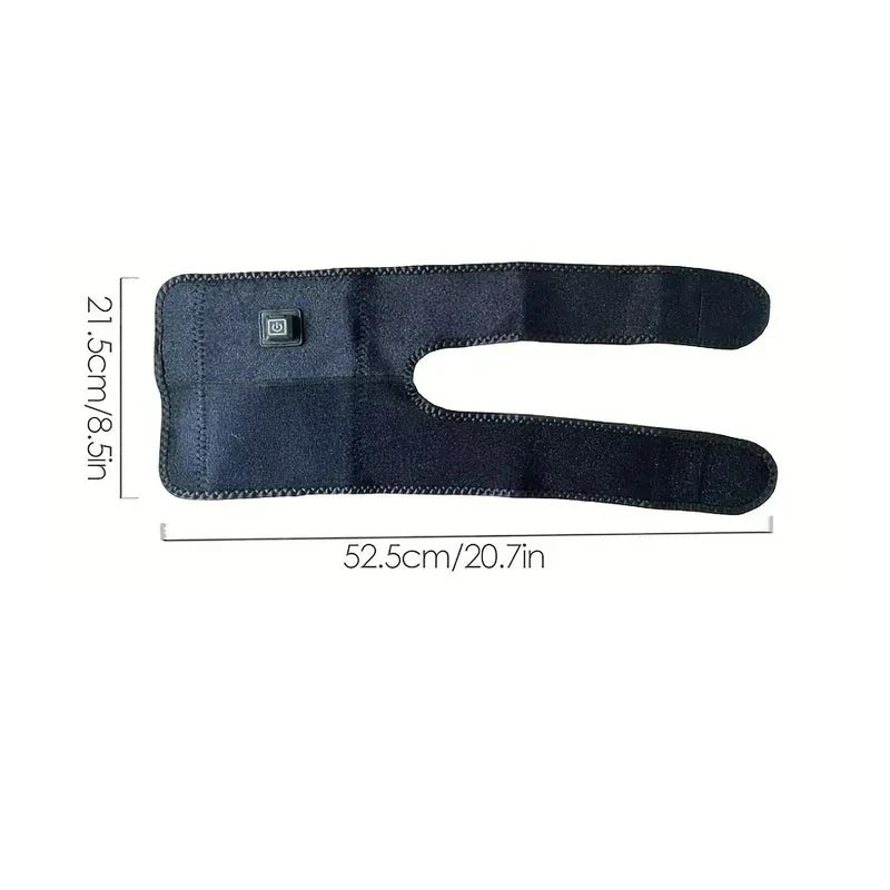 Genouillère chauffante - Genouillère chauffante à bande noire posée à plat, avec un bouton d'alimentation sur sa surface, 52,5 cm de long et 21,5 cm de large.