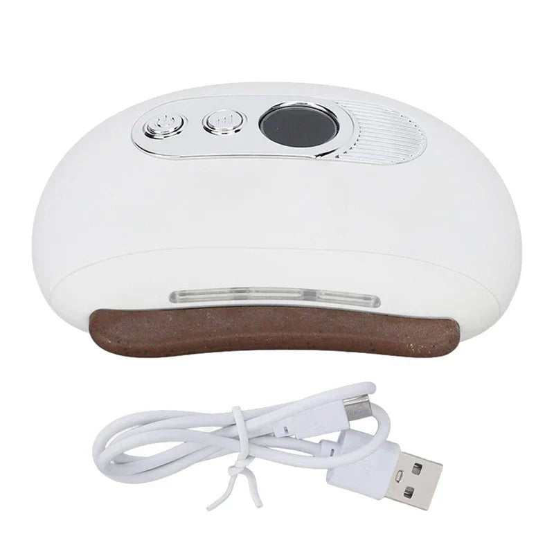 Scraping Therapy Tool - White electric gua sha device with brown scraping edge, shown with a white USB charging cable