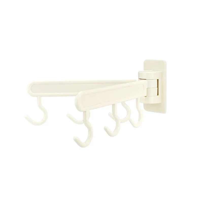 Adhesive Wall Hooks - Cream white rotating multi-arm wall hook with six curved hanging hooks, shown against a plain white background