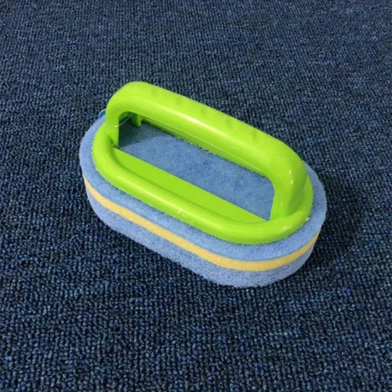 Heavy Duty Scrub Sponges - Cleaning brush with bright green plastic handle and blue layered sponge rests on dark blue carpet