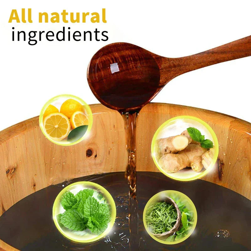 Bath Beads - Wooden foot bath with dark liquid being poured from a wooden spoon, with four circular insets showing lemon, ginger, mint, and green tea.