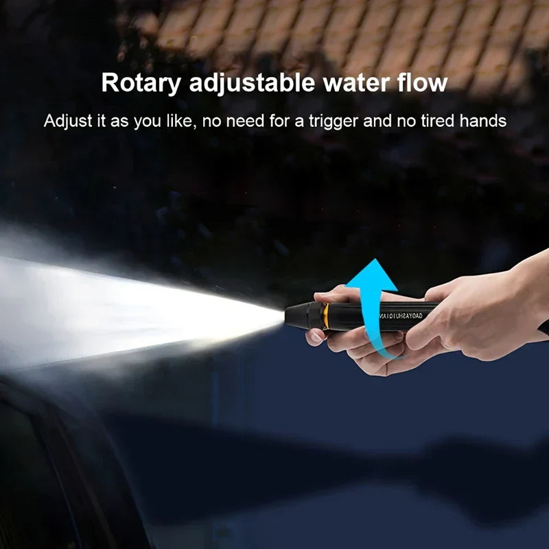 High Pressure Hose Nozzle - Hands hold a black water nozzle, adjusting it to produce a wide water spray against a dark outdoor background.