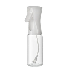 Mister Bottle - Clear glass spray bottle with white high-pressure trigger top, internal dip tube visible, empty
