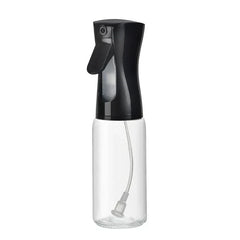 Mister Bottle - Single clear glass spray bottle with black pump top, empty, against plain white background.