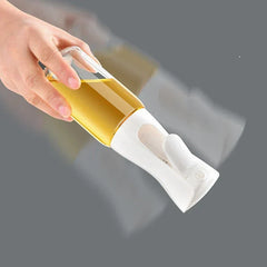 Mister Bottle - Hand holding a spray bottle, demonstrating the fine even mist spray output