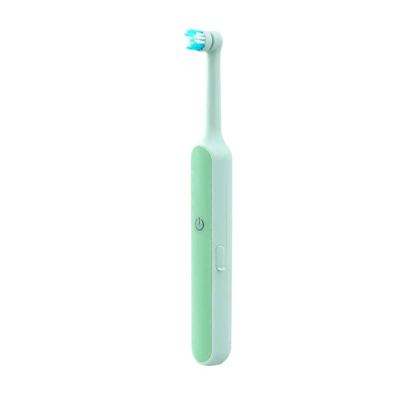 Cepillo de dientes eléctrico recargable - Vista vertical completa de un cepillo de dientes eléctrico verde menta claro con cabezal de cepillo redondo giratorio, sobre fondo blanco liso