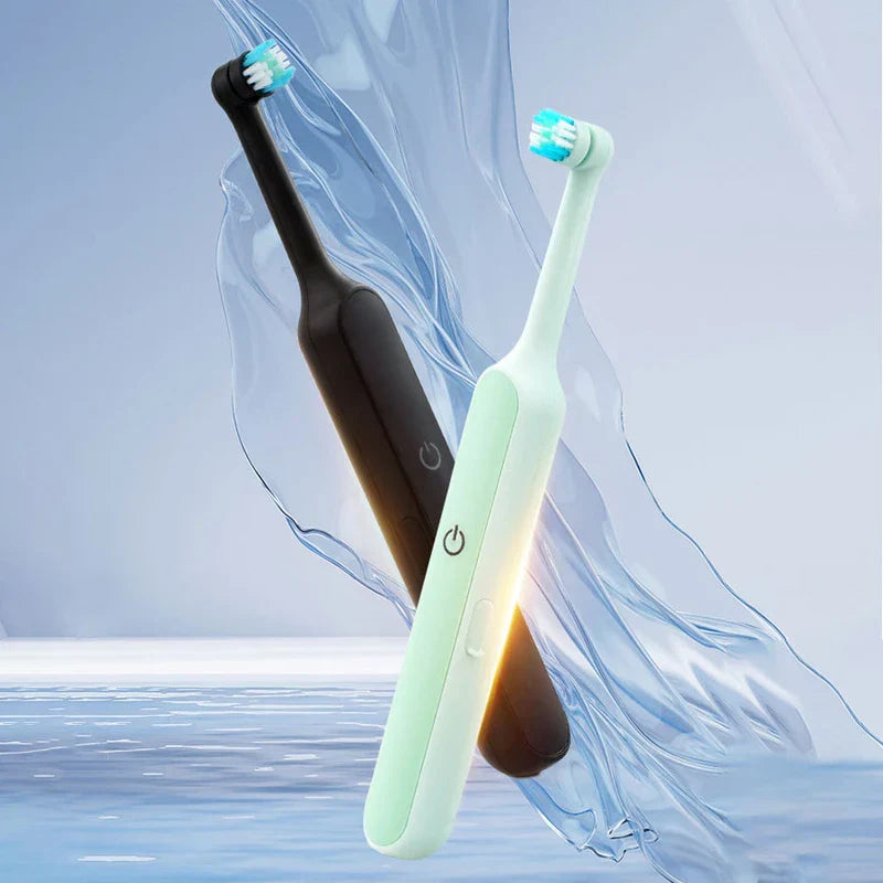 Mango de cepillo de dientes eléctrico sobre superficie limpia
