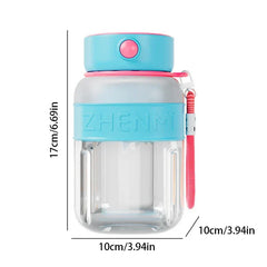 This smoothie maker tumbler bottle has blue-pink accents, a pink wrist strap, and measures 17cm tall by 10cm wide against a white background.