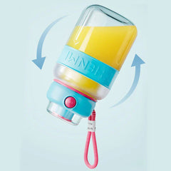 A smoothie maker tumbler bottle holding yellow liquid is tilted to show it is leakproof, with rotation arrows around it on a light blue background.