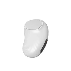 masajeador facial - Dispositivo de cuidado de la piel de mano blanco, liso y ovalado con parte superior metálica plana, botones de control laterales y área de agarre con ranuras