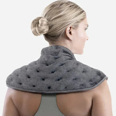 Hot Cold Therapy Neck Wrap - Back view of a woman with blonde hair in a bun wearing a gray weighted neck and shoulder wrap.