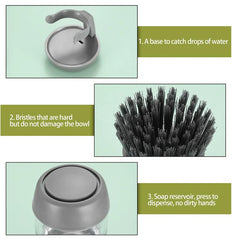 Pot scrubber brush in use on a stainless steel pan