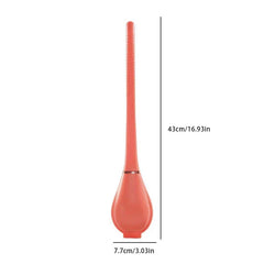 Coral-colored long-handled cleaning tool with dimensions marked; this is a bathroom bowl scrubber & caddy stand product view.