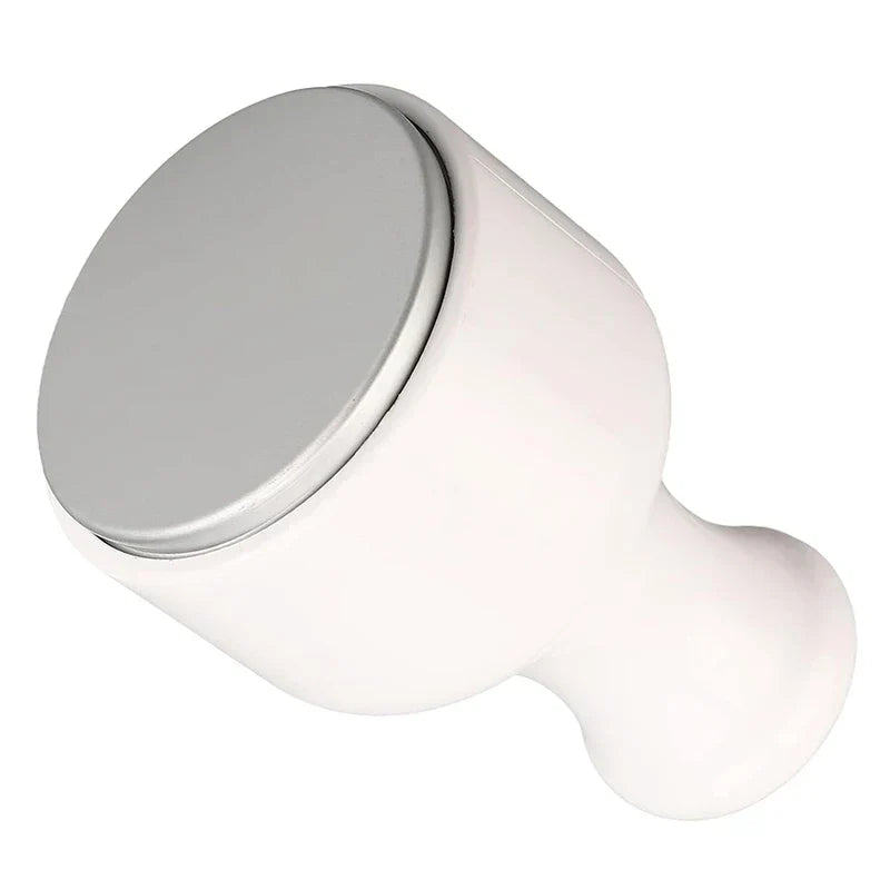 Ice Roller - Angled view of a white handheld beauty tool with a flat silver contact head on a plain white background
