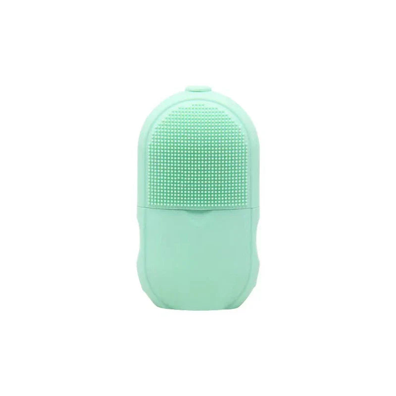 Facial Massager - Mint green silicone facial ice roller with a textured dotted upper surface